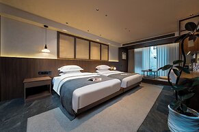 Fenghuang Yiquan River View B&B