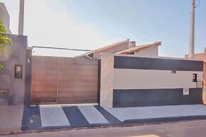 Casa com Garagem e Churrasqueira em Tima Regi o
