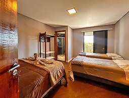 Casa com 4 Su tes Jacuzzi e Lareira Externa