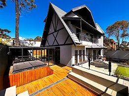 Casa com 4 Su tes Jacuzzi e Lareira Externa