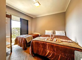 Casa com 4 Su tes Jacuzzi e Lareira Externa