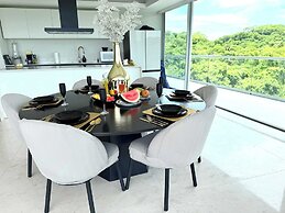 Luxury 2BR Bolongo Ocean View Private Beach