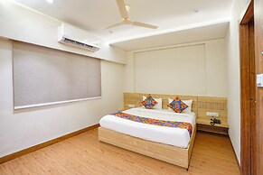 Fabhotel White Pearl