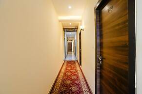 Fabhotel New Silver Elite