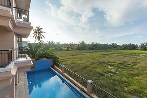 Palm Retreat 1BHK Pool & Field Views