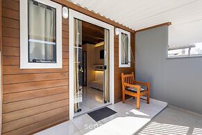 Comfortable and Sophisticated Accommodations Just Minutes From the Bea