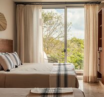 NHOA 312C Lux 1BR Condo in Aldea Zama