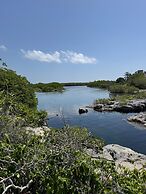 Villa con Piscina y Acceso a Laguna Yalkú, Akumal