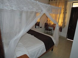 Kim's Breeze Hotel Ltd and Choma Zone