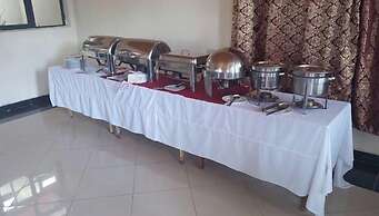Kim's Breeze Hotel Ltd and Choma Zone