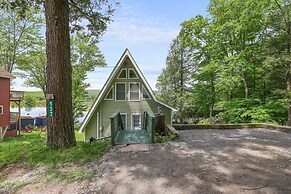 Lakefront A-frame Dock Kayaks Fire Place