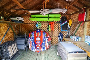 Lakefront A-frame Dock Kayaks Fire Place