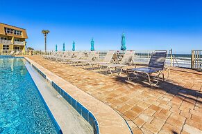 Beachfront Gem: Serene 2BD Haven With Pool & Views