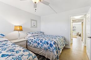 Beachfront Gem: Serene 2BD Haven With Pool & Views