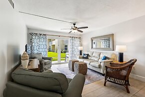 Beachfront Gem: Serene 2BD Haven With Pool & Views