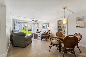 Beachfront Gem: Serene 2BD Haven With Pool & Views