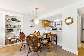 Beachfront Gem: Serene 2BD Haven With Pool & Views