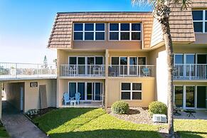 Beachfront Gem: Serene 2BD Haven With Pool & Views