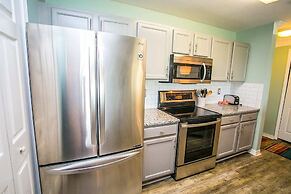 Seaside Haven: Stylish Condo, Garden Views