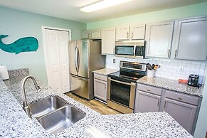 Seaside Haven: Stylish Condo, Garden Views