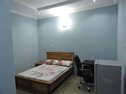 Wig and Gown Apartment