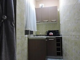 Wig and Gown Apartment