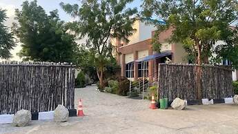 MTown Hotel and Suites