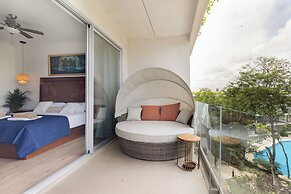 Stylish Playacar Condos w Balcony & Pool