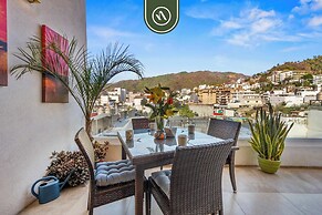 1BR Condo With Rooftop Pool - Romantic Zone