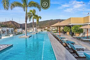 1BR Condo With Rooftop Pool - Romantic Zone
