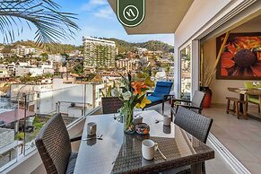 1BR Condo With Rooftop Pool - Romantic Zone