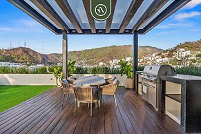 1BR Condo With Rooftop Pool - Romantic Zone