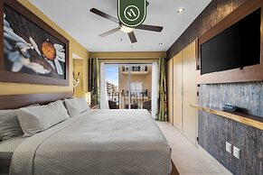 1BR Condo With Rooftop Pool - Romantic Zone