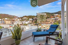 1BR Condo With Rooftop Pool - Romantic Zone