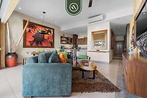 1BR Condo With Rooftop Pool - Romantic Zone