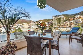 1BR Condo With Rooftop Pool - Romantic Zone