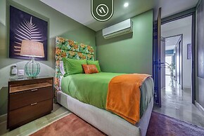 Beachfront Tropical 2 BR Condo - Pools - Gym