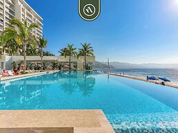 Beachfront Tropical 2 BR Condo - Pools - Gym
