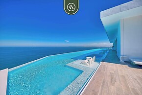 Oceanview Luxury Condo - Private Beach - Rooftpop