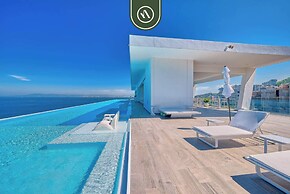 Oceanview Luxury Condo - Private Beach - Rooftpop