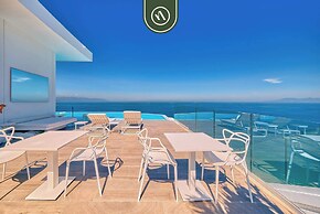 Oceanview Luxury Condo - Private Beach - Rooftpop