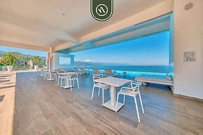 Oceanview Luxury Condo - Private Beach - Rooftpop