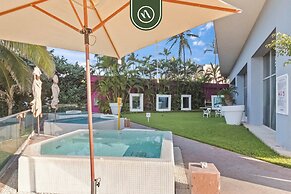 Beachfront 1 BR Condo With Multiple Pools - Gym