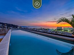 Corner 2 BR Condo - Rooftop Pool With Oceanview