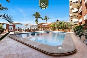 Beachfront Mexican Styled 3 BR Condo in Downtown