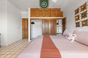 Beachfront Mexican Styled 3 BR Condo in Downtown