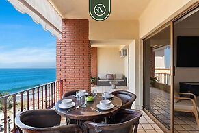 Beachfront Mexican Styled 3 BR Condo in Downtown