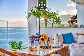 Luxurious 2 BR Condo - Oceanfront - Infinity Pools