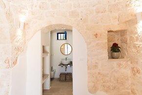 Trulli Scacciapensieri con Piscina