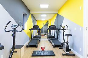 Modern, complete with Office, AC, and Gym